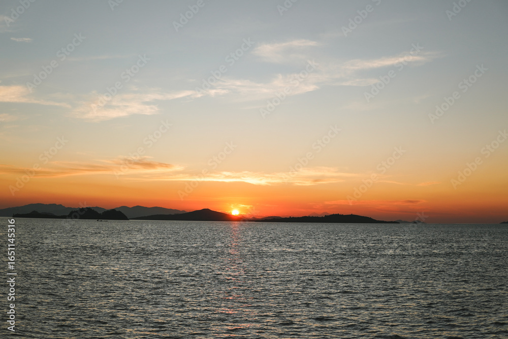 Obraz premium Beautiful scenery of sunset time in Labuan Bajo island, Indonesia.