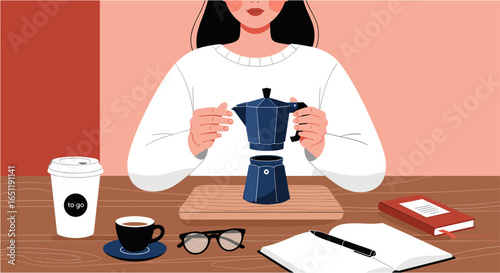 Female hands assembling moca pot at a wooden table