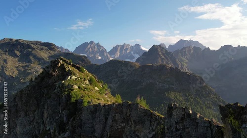 Flying over the crest of a mountain with a fantastic view