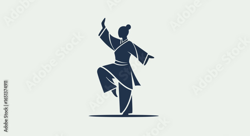 Silhouette of a person in traditional martial arts attire performing a dynamic stance.