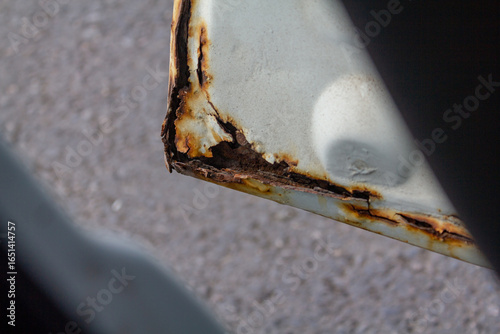 rust build on a car door