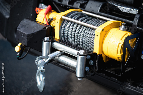Yellow winch of an off road vehicle