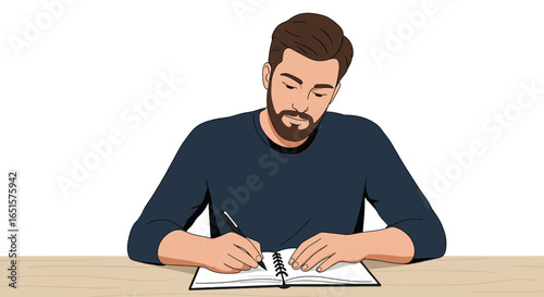 Focused young man with a beard and dark blue shirt writing in a notebook at a desk.