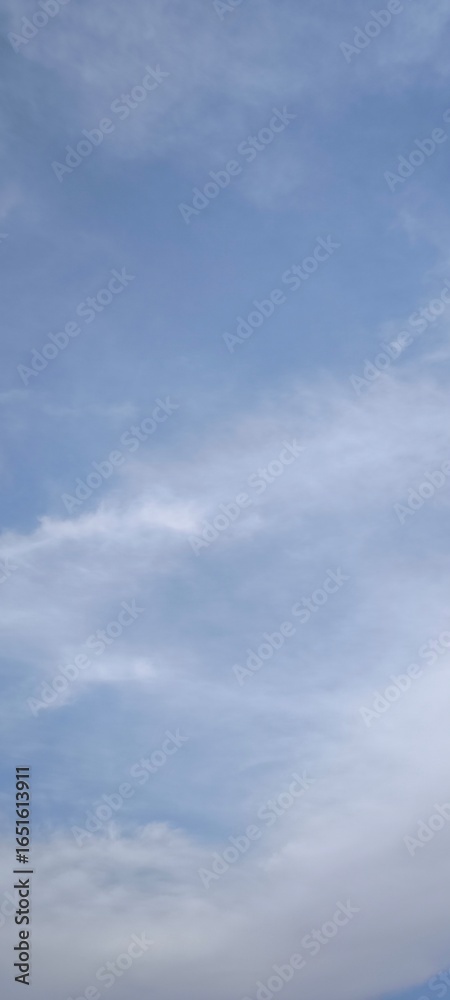 Obraz premium blue sky with white clouds. The sky is clear and bright