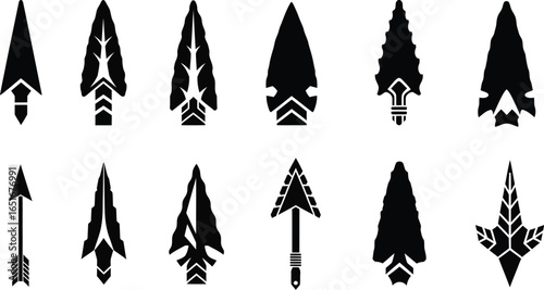 Collection of diverse black tribal arrowheads and a single feathered arrow in a clean vector illustration