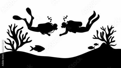 Two scuba divers exploring underwater with coral reefs and fish in a monochrome black and white scene view silhouette