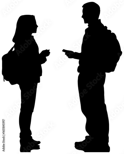 Silhouette of Principal Talking to a Student in Corridor