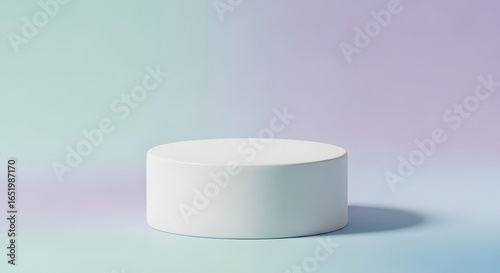 Sleek white pedestal stage for product display against soft pastel gradient background