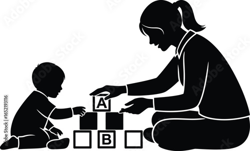 Silhouette of a mother and child playing with alphabet blocks, fostering early learning and development through play