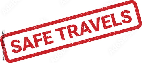 Red distressed stamp imprinted with SAFE TRAVELS in white letters across a