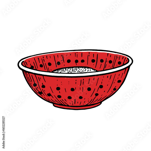 Red colander on a white 
