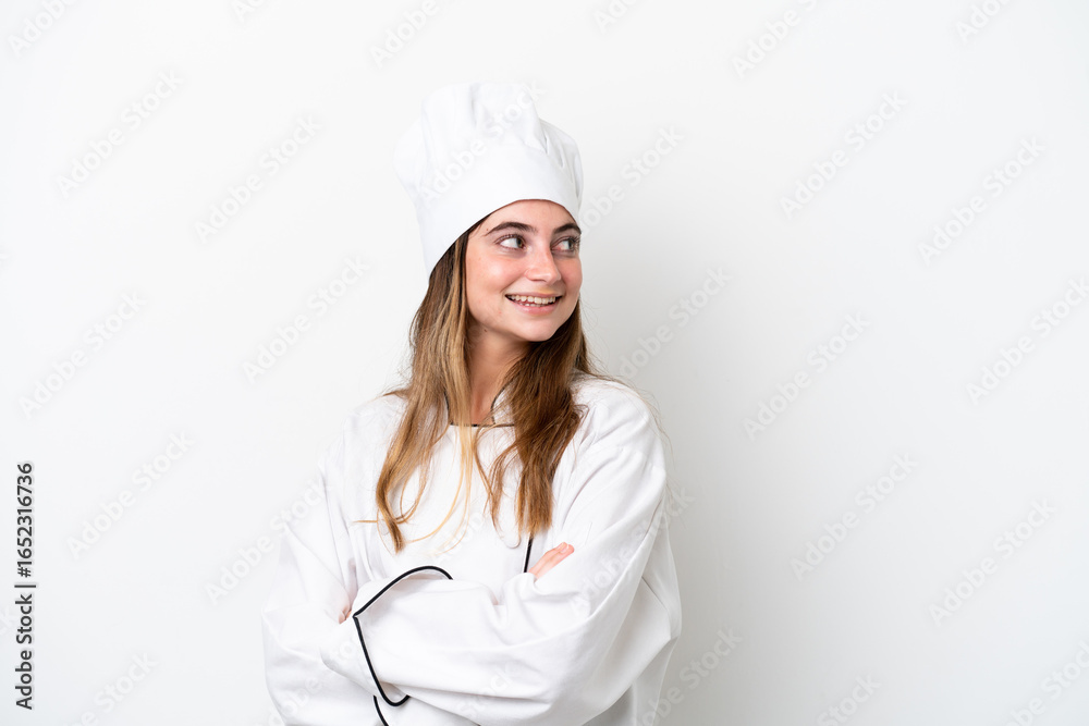 Young caucasian chef woman isolated on white background with arms crossed and happy Young caucasian chef woman isolated on white background with arms crossed and happy