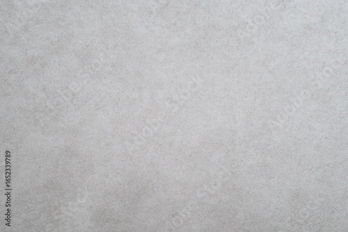 Neutral gray vertical gradient paper background with subtle texture, minimalist design for professional documents and creative projects