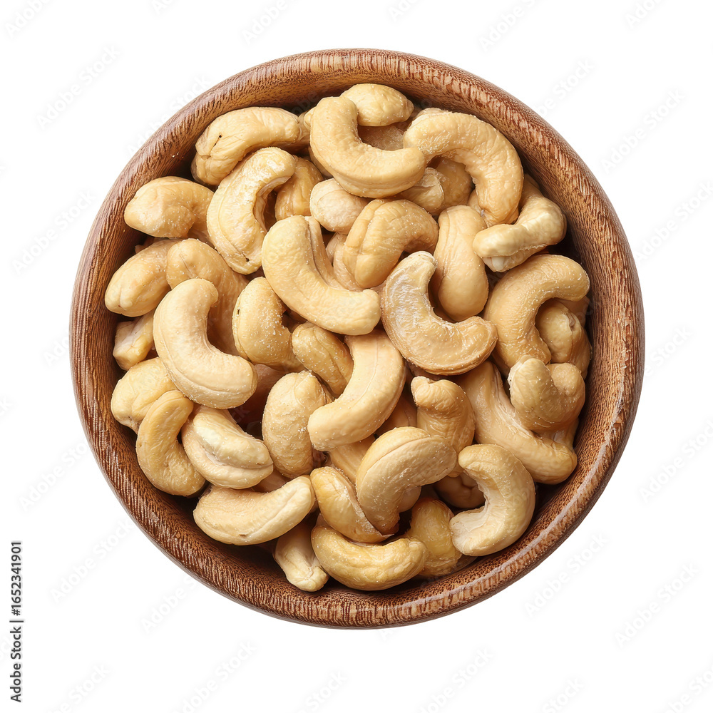 Fototapeta premium Freshly roasted cashew nuts in a wooden bowl ready to be enjoyed as a healthy snack