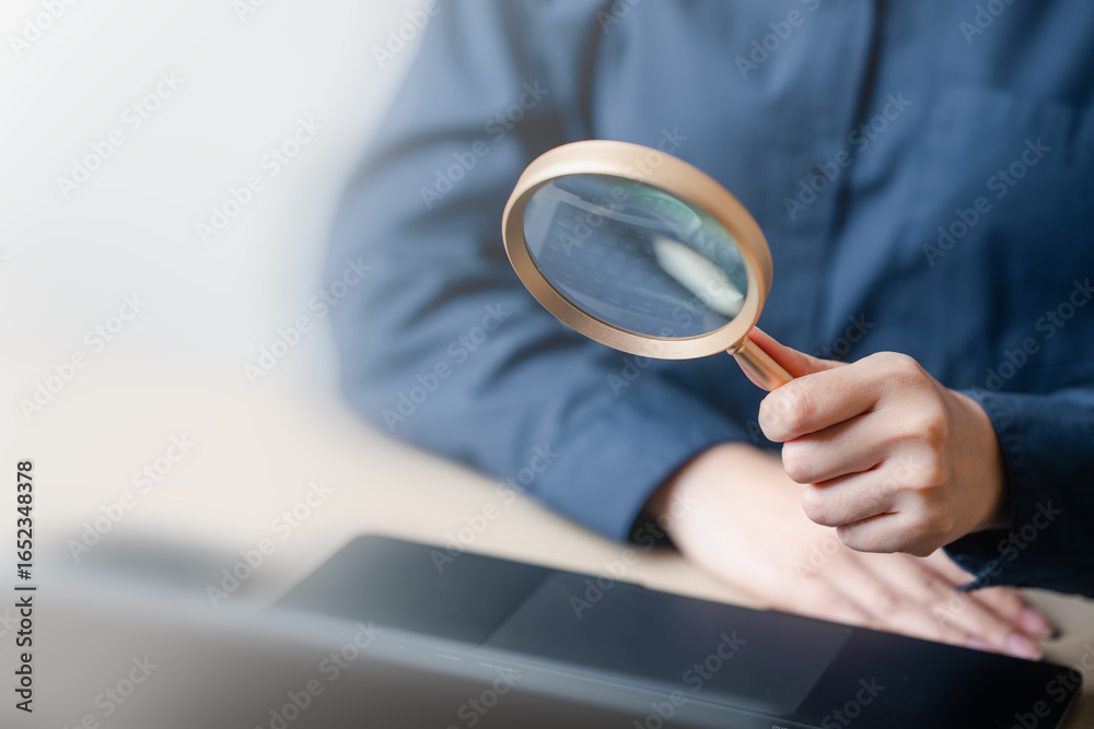 Fototapeta premium Using magnifying glass web search internet. Magnifier finance audit accounting. Magnifier analyzing research. Magnifying glass analyzing target audience marketing Woman job search website. Magnifying