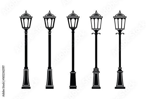 Row of five vintage black lampposts in a classic design on a white background