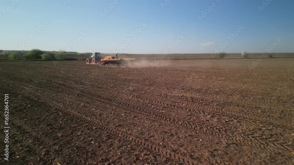 Powerful Tractor Sowing Corn with Precision Planter in Ukraine Powerful Tractor Sowing Corn with Precision Planter in Ukraine