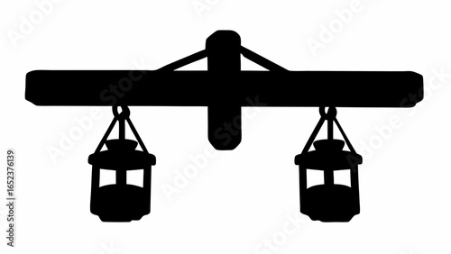 Silhouette of a wooden beam structure with two hanging lanterns suspended by chains on each side evenly