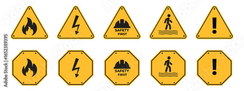 Set of Warning or Danger Sign with a skull, biohazard, working and fallout symbols in yellow triangle sign vector illustration