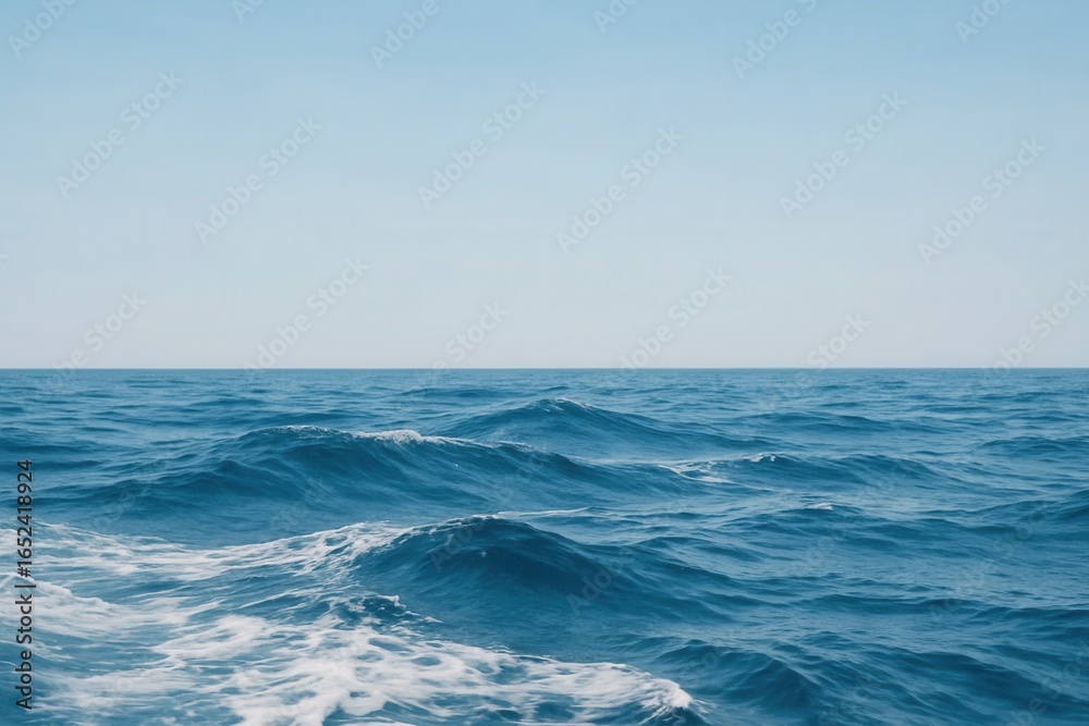 Obraz premium A Serene Ocean Under a Clear Sky