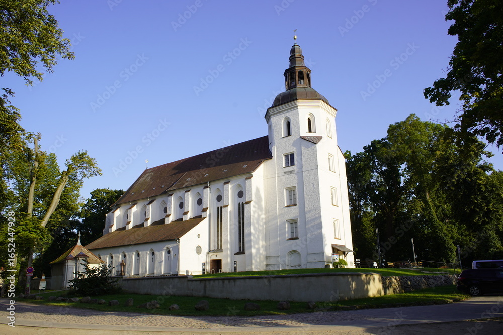 Fototapeta premium The Johanniterkirche Mirow (sometimes also Stadtkirche Mirow, Parish Church Mirow, Schlosskirche Mirow) is a listed church building on the Schlossinsel in Mirow in Mecklenburg-Western Pomerania. Germa