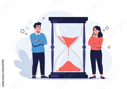 Two people standing next to a large hourglass waiting for time to pass