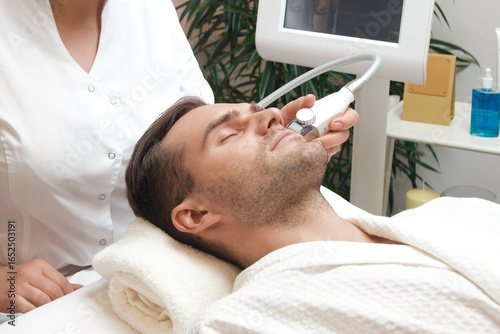 young man in spa salon