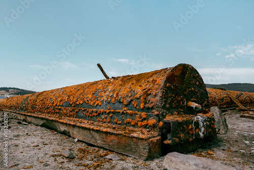 rusty old rusty truck on the shore