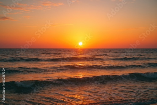 Serene twilight scene featuring a stunning sunset illuminating the peaceful sea