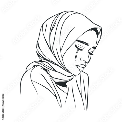 Emotional portrait of a woman in a headscarf experiencing sadness