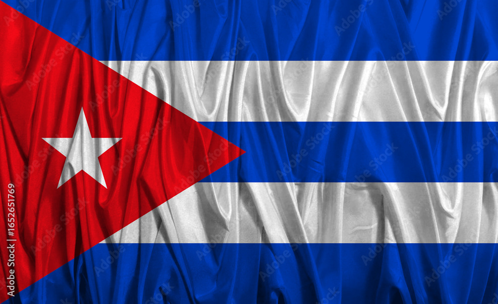 Naklejka premium Cuban flag waving proudly under a bright blue sky