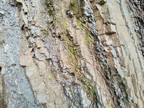 Texture of rock and natural stone. Texture of natural quarries. Knee rock. Natural minerals. Geodesy