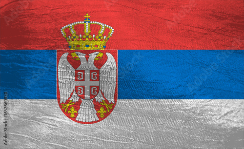 Serbia's vibrant flag waving under bright sunlight in the open sky