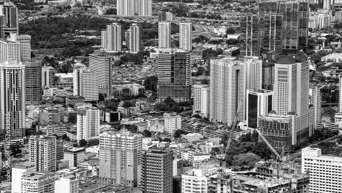 Photography Kuala Lumpur, Malaysia - December 28, 2019: Dramatic aerial view of Kuala Lumpur