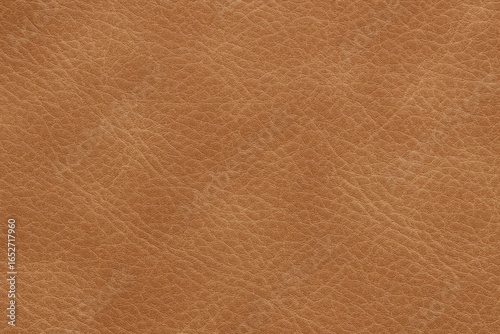 Leather texture with a soft light brown hue and matching background