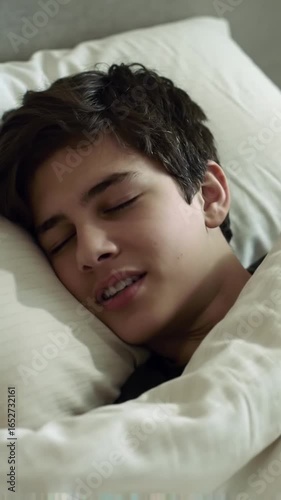 Person sleeping peacefully in bed