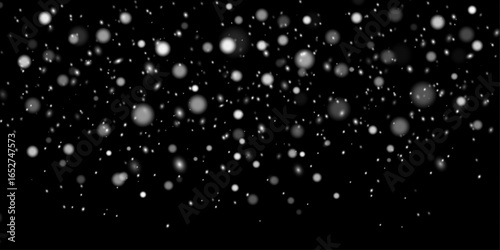 Snowfall on a dark background with blurred snowflakes swirling in the air. Winter storm and night snow effect. Vector.