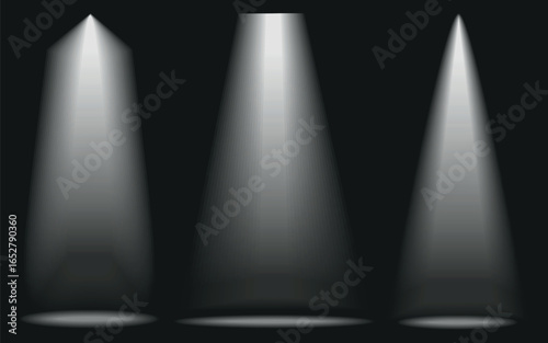 three light beams forming cones of light on a dark background. Each beam has a soft, gradual dimming from the center to the edges, creating a spotlight or stage lighting effect.