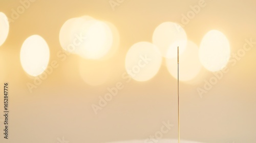 Soft bokeh lights and a single vertical line