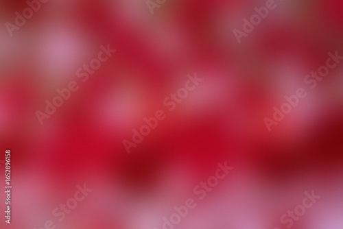 Soft focus abstract background of vibrant red and pink hues