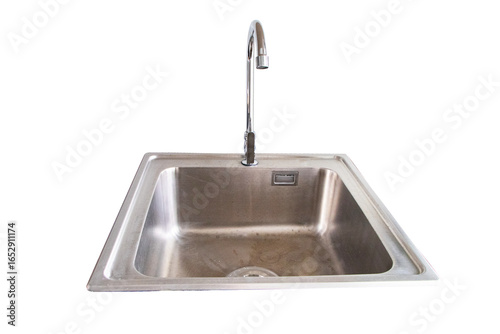 Kitchen sink modern detail with polished chrome silver faucet black isolated on cut out PNG or transparent background. Minimalist design and materials add touch of elegance to kitchen.