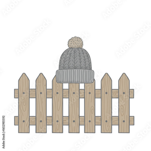 Woolen hat  on a wooden fence in flat vector design  