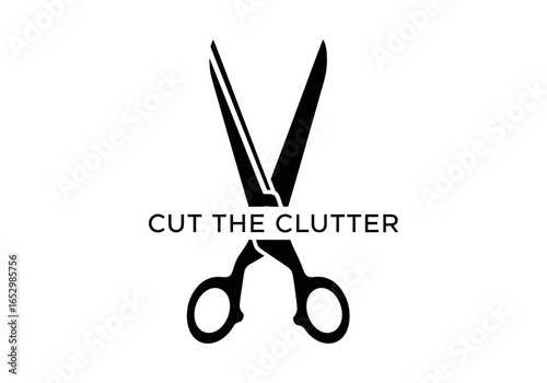 Scissors cutting the words cut the clutter isolated on white background