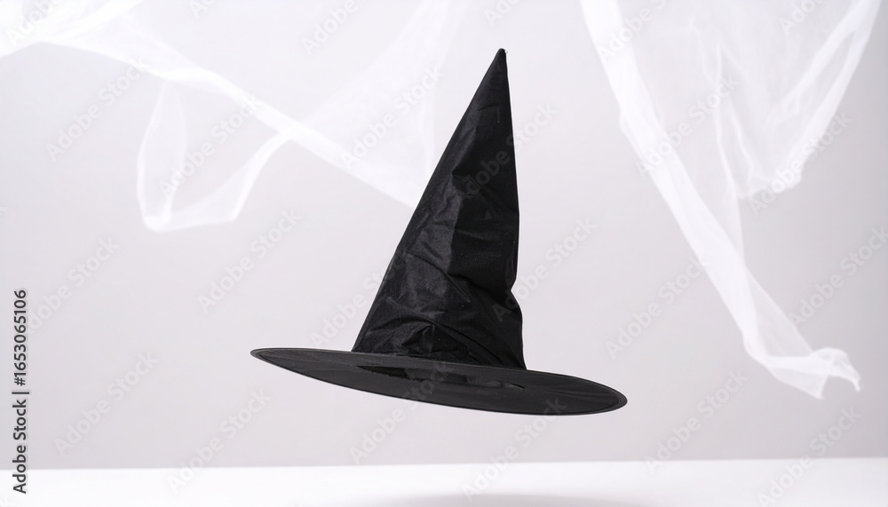 Fototapeta premium Floating Black Hat with White Negative Space