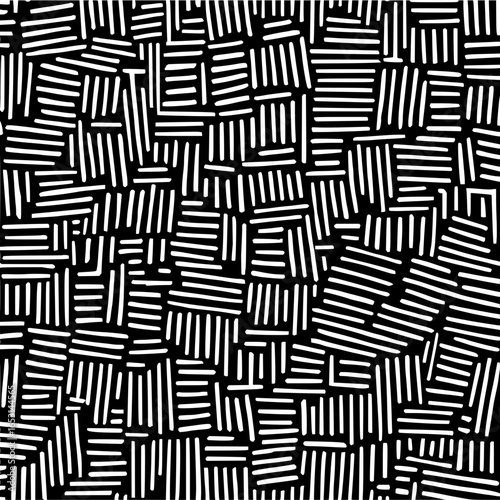 Abstract monochrome pattern featuring short white lines arranged in varying orientations and densities