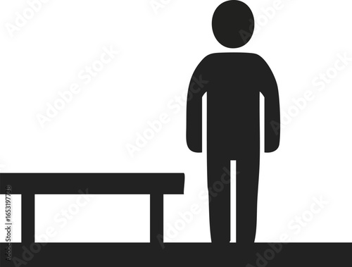Silhouette of a person standing next to a bench, symbolizing waiting or contemplation.
