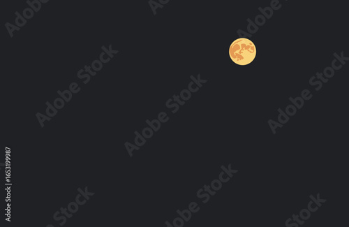 Full moon glowing brightly in a dark sky above silhouetted trees