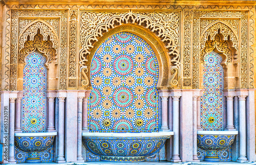 Moroccan style fountain with fine colorful mosaic tiles at the Mohammed V mausoleum in Rabat Morocco