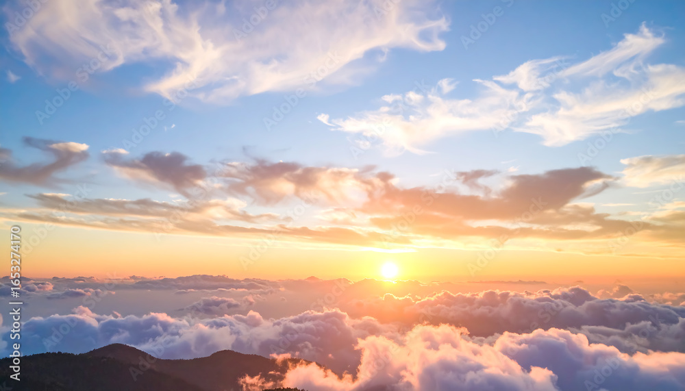 Fototapeta premium Serene Sunset Above Mountains: Golden Hour Cloudscape, Aerial View, Peaceful Atmosphere, Inspirational Nature Photography.