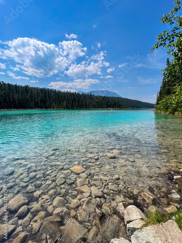The turquoise waters and rocky bottom of the First Lake, Valley of the Five Lakes, Jasper NP, Canada